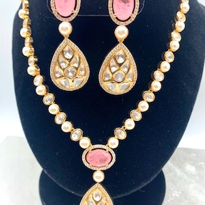 Sabyasachi inspired uncut  Moissanite Polki kundan with fresh water pearl and light pink doublet stone set.