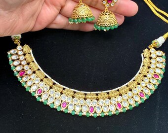 Kundan polki  necklace & jhumka earrings with semi precious ruby stones. Statement necklace