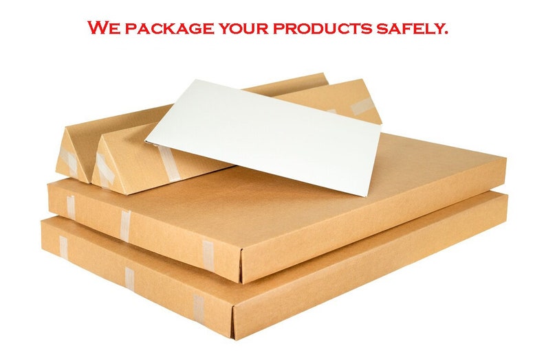 May include: A stack of three brown cardboard boxes with tape, one box is partially open and a white piece of cardboard is sticking out.