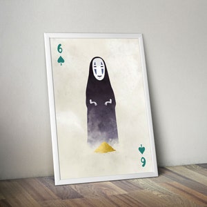 May include: Framed art print featuring a stylized illustration of a character from Spirited Away. The image resembles a playing card, with a black figure and a pile of gold. The numbers 6 and 9, along with spade symbols, are visible.