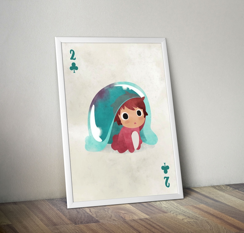 May include: A white framed print of a playing card with a cartoon illustration of a child in a blue and green bubble. The card is the two of clubs.