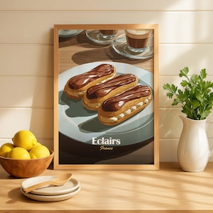 May include: A framed print showing three chocolate eclairs on a plate, with the text "Eclairs France". The image also includes coffee cups and a bowl of lemons, creating a cafe theme.