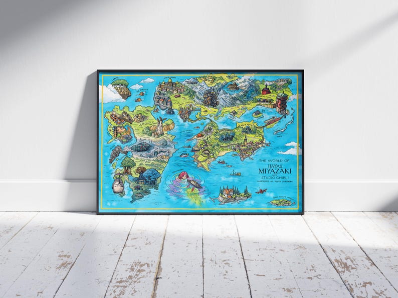 May include: A colorful illustrated map of the worlds of Hayao Miyazaki's Studio Ghibli films. The map features iconic locations and characters from films like Spirited Away, My Neighbor Totoro, Princess Mononoke, and Howl's Moving Castle.