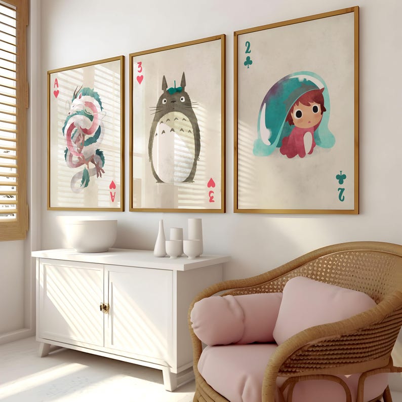 May include: Three framed prints with watercolor illustrations of a dragon, a Totoro character, and a girl with a flower crown. Each print features a playing card design with the number and suit of the card.