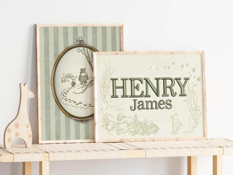 May include: Two framed prints with Winnie the Pooh illustrations. One has a striped background and a circular image of Pooh and Piglet. The other print says "HENRY James" in green letters, with more Pooh illustrations.