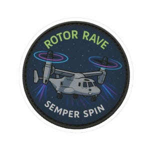 May include: A round sticker featuring a gray tiltrotor aircraft with spinning propellers and colorful light trails. The text "ROTOR RAVE" arches above the aircraft, and "SEMPER SPIN" is below, all on a dark blue starry background.
