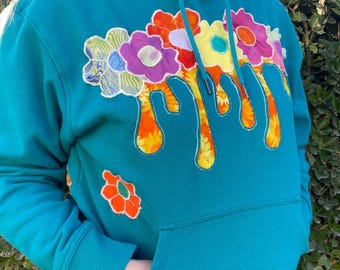 Reworked teal daisy hoodie