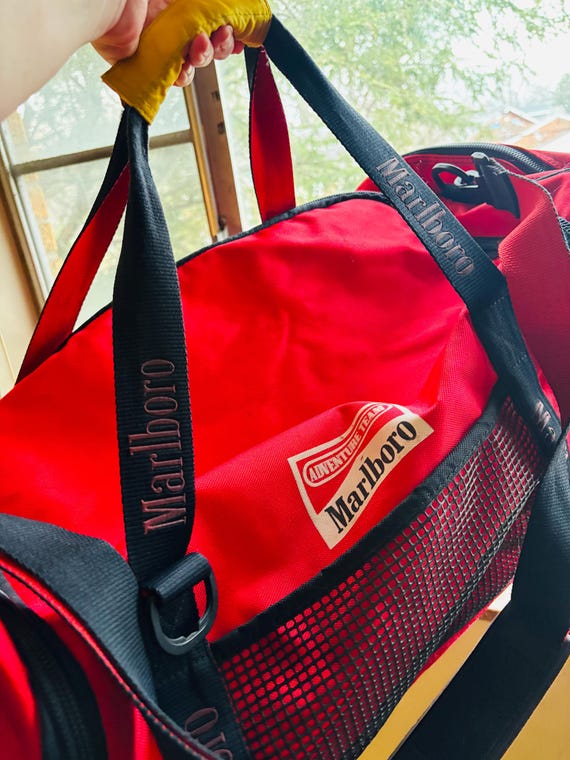 Vintage 90s Marlboro Adventure Team Duffel Bag — Extra Large Red Vintage 90s Marlboro Adventure Team Duffel Bag — Extra Large Red