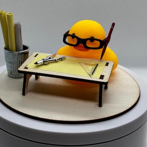 Architect Rubber Duck: A blueprint-inspired duck for architects and designers.