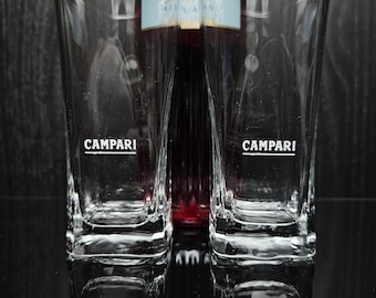 2 vintage Campari long drink glasses. Decorated with a white inscription 'Campari'. Italy 1980s. Cocktail glass. Bar item. Collector's item.