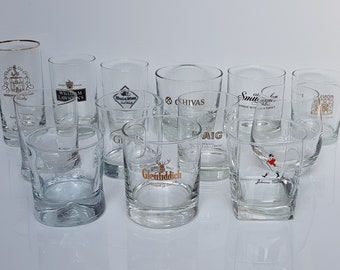 13x whiskey glasses. Set of 13 vintage whiskey glasses from different brands.