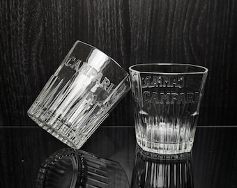 2 vintage Campari cocktail glasses. Ribbed glass, decorated with the relief inscription 'Campari'. Italy - 1980s.