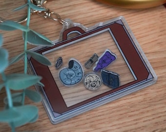 Frieren Suitcase Acrylic Shaker Keychain 3" x 2.25" - [ crystal clear acrylic / fun shaker pieces /  Himmel's ring / clothes-melting potion]