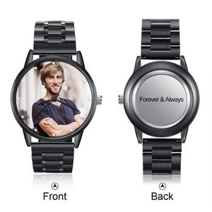 May include: A black metal wristwatch with a link band. The watch face features a custom photograph of a person with brown hair wearing a dark t-shirt. The back of the watch case is silver-toned and engraved with the text Forever & Always.
