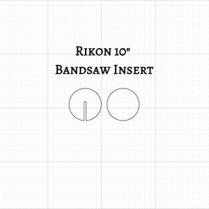 May include: A diagram of a bandsaw insert with the text "Rikon 10" Bandsaw Insert". The insert features two circular cutouts, one with a vertical slot. The background is a grid pattern.