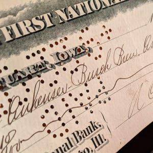 Unieke Anheuser-Busch-bankcheque van bank beroofd door Bonnie & Clyde (alleen digitaal)