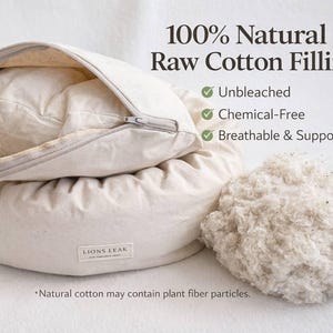 Natural raw cotton dog bed filling close up, unbleached chemical free cotton fiber, breathable supportive pet bed filling, eco friendly dog bed materials