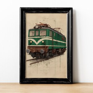 May include: Framed artwork featuring a vintage green and white electric train on tracks. The train has a detailed design with a brown front and is set against a blueprint-style background. The artwork is encased in a black frame.