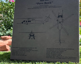 May include: A black and white line drawing of a HH-60 Pave Hawk helicopter. The drawing shows the helicopter from the side and from above. The text on the image reads "HH-60 "Pave Hawk" Primary Function Personnel recovery in hostile conditions and military operations other than war in day, night or marginal weather Power Plant: Two General Electric T700-GE-700 or T700-GE-701C engines Thrust: 1,560-1,940 shaft horsepower, each engine Rotor Diameter: 33 ft. 7 in (10.2 m) Length: 64 ft. 8 in (19.7 m) Height: 16 ft. 8 in (5.1 m) Weight: 22,000 lbs (9,979 kg) Maximum Takeoff Weight: 22,000 lbs (9,979 kg) Fuel Capacity: 4,500 lbs (2,041 kg) Payload: depends upon mission Speed: 184 mph (150 knots) Range: 504 nautical miles Ceiling: 14,000 ft (4,267 m) Armament: Two 7.62mm or .50 caliber machineguns Crew: Two pilots, one flight engineer and one gunner"
