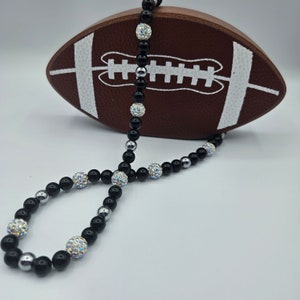Beaded necklace with 8mm glass beads accented with rhinestone disco beads