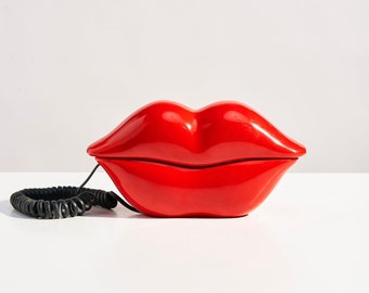 Vintage rode lippen telefoon uit de jaren 80