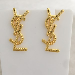 Vintage Yves Saint Laurent  Gold stud earrings