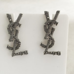 Vintage Yves Saint Laurent silver brass stud earrings