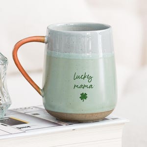 May include: A rustic wooden sign with the text "Welcome to our porch" in white lettering. The sign features a distressed finish and a simple, inviting design, perfect for outdoor decor.