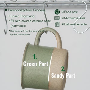 May include: A two-toned ceramic mug with a green and sandy color scheme. The mug has a capacity of 9.5oz (280ml) and is microwave and dishwasher safe. The mug features the text "Oneup custom ceramic gifts".