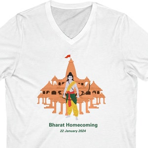 May include: A white t-shirt featuring a graphic of a man standing in front of a temple. The graphic is in orange, yellow, green, and red. The text "Bharat Homecoming 22 January 2024" is below the graphic.