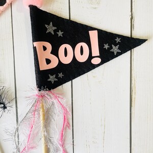 Add a touch of handmade Halloween magic with our BOO Felt Pennant Flags, designed with love for your pinkoween or classic spooky setup.

Our charming felt flags are perfect for decorating Halloween parties, trick-or-treat baskets, shelves, or flat lays—anywhere you want to sprinkle a little boo-tiful cheer!