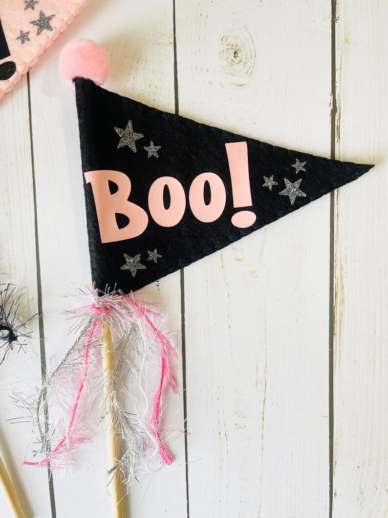 Add a touch of handmade Halloween magic with our BOO Felt Pennant Flags, designed with love for your pinkoween or classic spooky setup.

Our charming felt flags are perfect for decorating Halloween parties, trick-or-treat baskets, shelves, or flat lays—anywhere you want to sprinkle a little boo-tiful cheer!