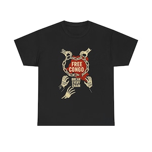 May include: Black t-shirt with a graphic design. The design features a red map of Congo, encircled by a chain, with the words "FREE CONGO" in white. Below the map, it reads "BREAK EVERY CHAIN". The design includes hands and text.