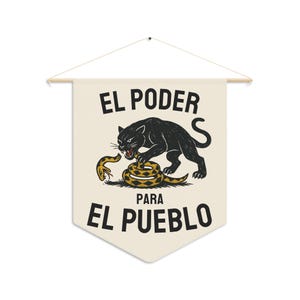 May include: Cream-colored wall hanging with a wooden dowel and string. The design features a black panther attacking a yellow and brown snake, with the words "EL PODER PARA EL PUEBLO" in black text.