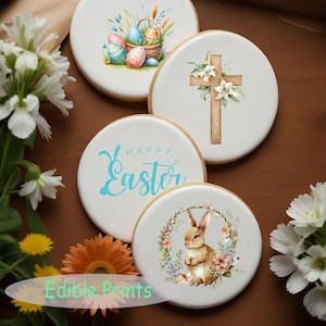 May include: Four edible cookie images printed with Easter themes. One image features a cross with flowers, another has a bunny in a wreath, another says "Happy Easter" in blue script, and the last one has a basket of Easter eggs with flowers.