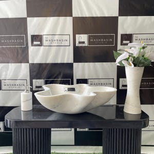 White Marble Countertop Washbasin – Handcrafted Stone Sink for Elegant Bathrooms.