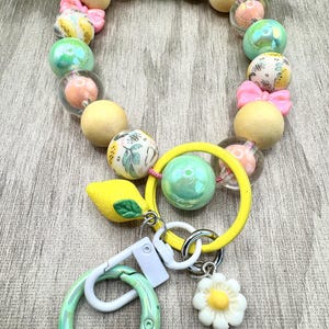 Llavero de pulsera con cuentas / Llavero de pulsera con flores / Llavero de pulsera con limón / Llavero de pulsera con cuentas de silicona