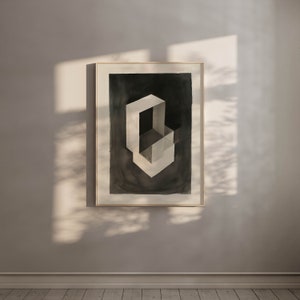 May include: A framed black and white abstract painting of a geometric shape. The shape is made up of overlapping squares and rectangles, creating a sense of depth and dimension. The painting is set against a light gray background.
