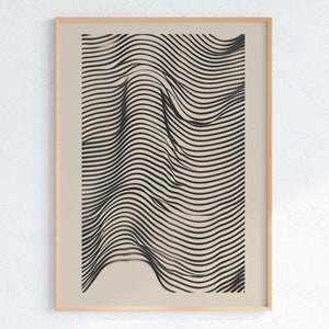 May include: Abstract art print with a black and white wavy design. The artwork is framed in a light wood frame and set against a neutral background. The lines create a three-dimensional effect, adding depth to the piece. Suitable for modern home decor.