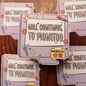 May include: A collection of stickers with a computer monitor design. The stickers feature the text "WILL CONTINUE TO MONITOR" in a bold font. Additional graphics include flowers, stars, a caduceus, and a speech bubble with the hashtag "#NURSELIFE".