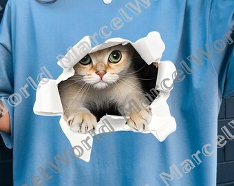 Op de afbeelding: Lichtblauw T-shirt met een 3D-afbeelding van een kat die door een gat kijkt. De kat heeft groene ogen en een lichtbruine en witte vacht. Het shirt is een casual stijl, geschikt voor dagelijks gebruik.