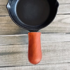 Handtagsskydd i gjutjärn