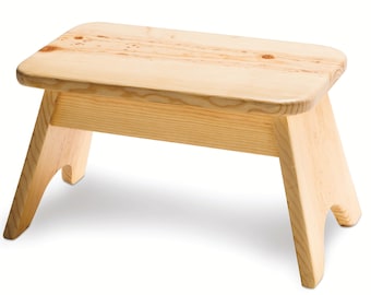 May include: A natural wood step stool with a rounded top and angled legs. The stool is made of light wood with a natural finish.