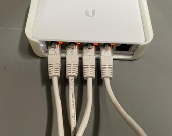 Switch gestito Ubiquiti USW-Flex-Mini 5x Gigabit Ethernet - 1xPoE montaggio a parete v2