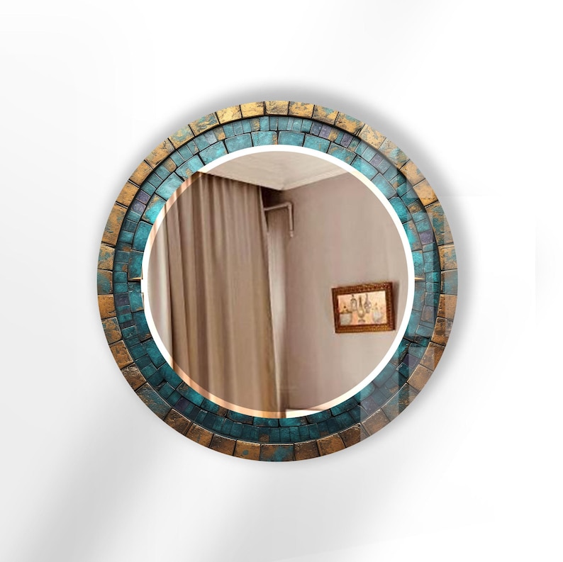 a round mirror with a blue and gold frame