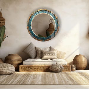 a living room with a couch, mirror and vases