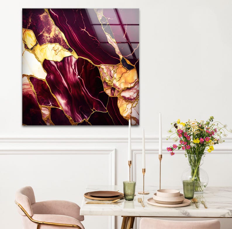 a dining room table with a vase of flowers on it