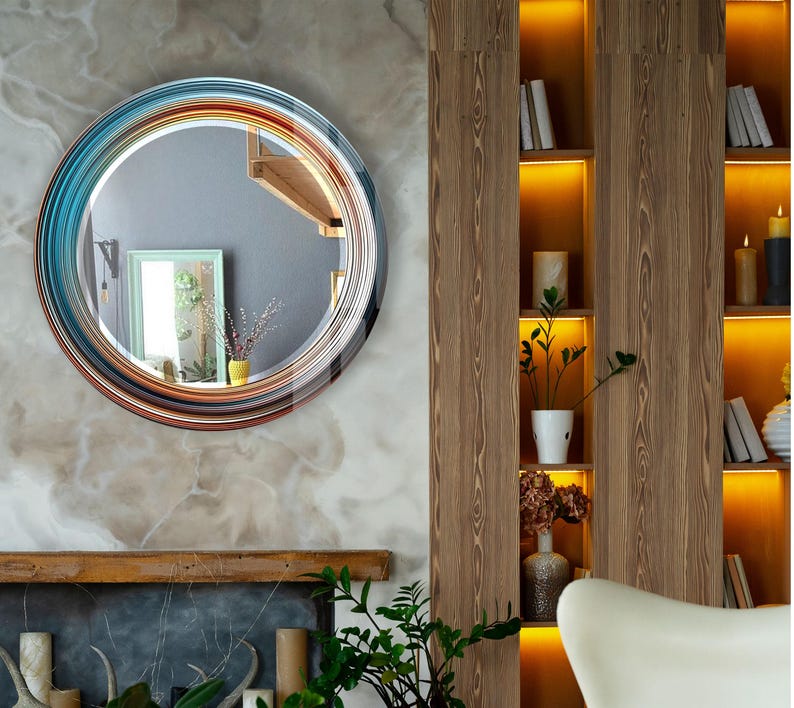 a living room with a fireplace and a round mirror
