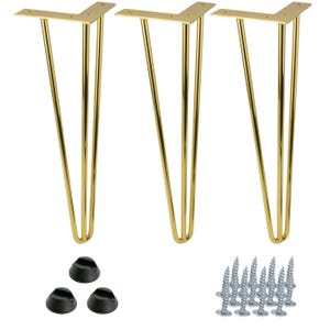 Może przedstawiać: Trzy złote nóżki do mebli w kształcie szpilek z płytkami montażowymi, czarnymi gumowymi nóżkami i srebrnymi śrubami. Nóżki te są przeznaczone do projektów DIY, oferując nowoczesną estetykę.
