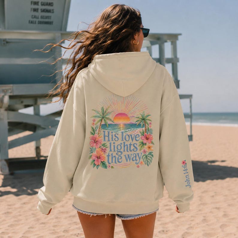 Christian Women Faith Inspired Pullover Sweatshirt Teen Girl Youth Group Shirt Religious Camp Apparel Jesus Love Theme Teenage Gift Ocean Sunrise Scene Palm Tree Front Design His Love Lights Way Back Cursive Text John Verse Flower Sleeve